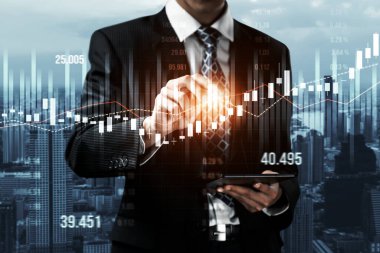Businessman analyst working with digital finance business data graph showing technology of investment strategy for perceptive financial business decision. Digital economic analysis technology concept.