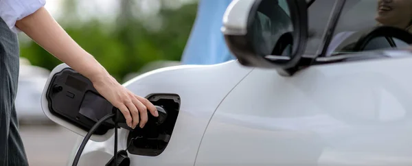 Closeup Focus Hand Insert Charger Electric Vehicle Public Charging Point — Fotografia de Stock