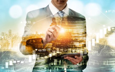 Businessman analyst working with digital finance business data graph showing technology of investment strategy for perceptive financial business decision. Digital economic analysis technology concept.