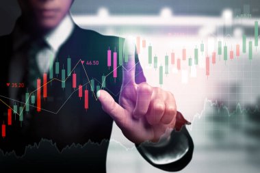 Businessman analyst working with digital finance business data graph showing technology of investment strategy for perceptive financial business decision. Digital economic analysis technology concept.