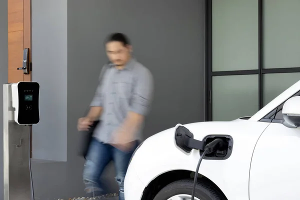 Focus Electric Car Charging Home Charging Station Blurred Progressive Man —  Fotos de Stock