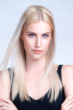 Closeup personable beautiful woman portrait with perfect smooth clean skin and natural makeup portrait in isolated background. Hand gesture with expressive facial expression for beauty model concept.