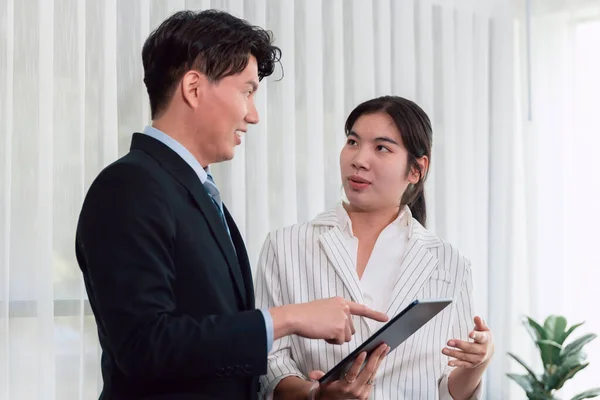 Manager Advising Guiding Younger Colleague Tablet Workplace Couple Businesspeople Formal — 图库照片