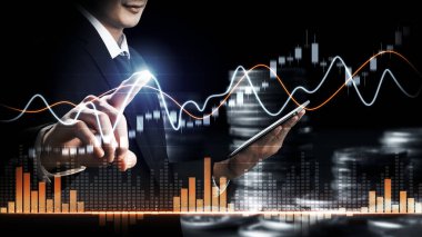 Businessman analyst working with digital finance business data graph showing technology of investment strategy for perceptive financial business decision. Digital economic analysis technology concept.