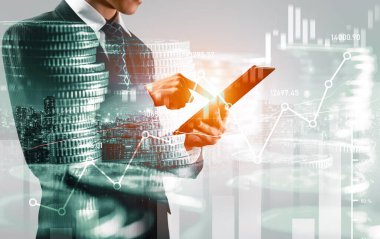 Businessman analyst working with digital finance business data graph showing technology of investment strategy for perceptive financial business decision. Digital economic analysis technology concept.