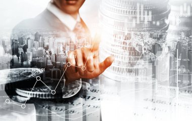 Businessman analyst working with digital finance business data graph showing technology of investment strategy for perceptive financial business decision. Digital economic analysis technology concept.