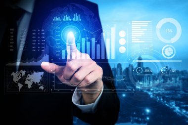 Businessman analyst working with digital finance business data graph showing technology of investment strategy for perceptive financial business decision. Digital economic analysis technology concept.