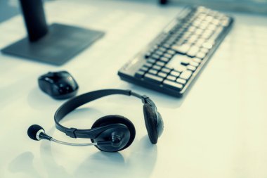 Essential equipment concept for competent online operators, call service agents, or online working. Customer service equipment, as well as helpdesk tools.