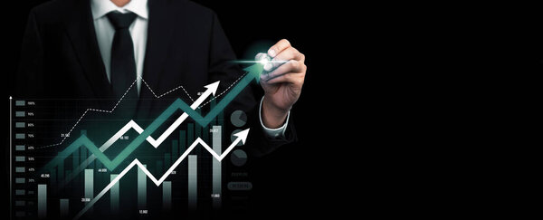 Businessman analyst working with digital finance business data graph showing technology of investment strategy for perceptive financial business decision. Digital economic analysis technology concept.