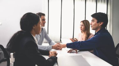 Commercial contract signed by competent people of various ethnicities. Trade agreements, two-party business transactions.