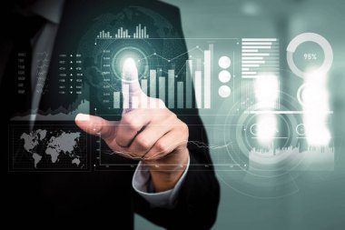 Businessman analyst working with digital finance business data graph showing technology of investment strategy for perceptive financial business decision. Digital economic analysis technology concept.