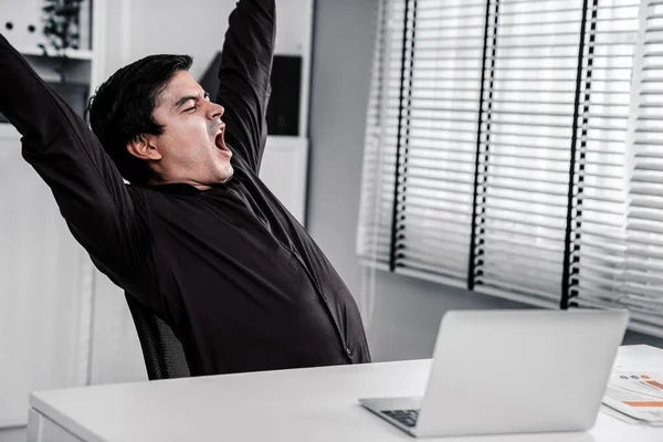 stock image The exhausted asian office worker who was once competent is now confused. Overtime work is causing boredom and exhaustion in the workplace.