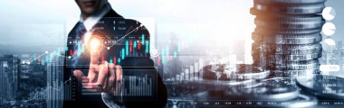 Businessman analyst working with digital finance business data graph showing technology of investment strategy for perceptive financial business decision. Digital economic analysis technology concept.