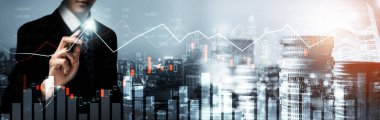 Businessman analyst working with digital finance business data graph showing technology of investment strategy for perceptive financial business decision. Digital economic analysis technology concept.