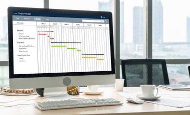 Ekip projesinin zaman çizelgesini gösteren bilgisayar ekranında, modern iş projesi yönetimi için proje planlama yazılımı