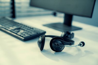 Essential equipment concept for competent online operators, call service agents, or online working. Customer service equipment, as well as helpdesk tools.