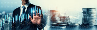 Businessman analyst working with digital finance business data graph showing technology of investment strategy for perceptive financial business decision. Digital economic analysis technology concept.