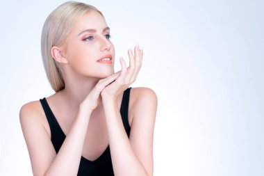 Pretty personable beautiful woman portrait with perfect smooth clean skin and natural makeup portrait in isolated background. Hand gesture with expressive facial expression for beauty model concept.