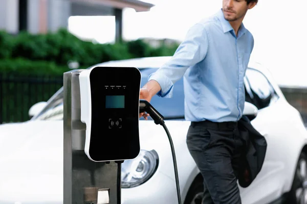 Progressive Businessman Insert Charger Plug Charging Station His Electric Vehicle — ストック写真