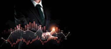 Businessman analyst working with digital finance business data graph showing technology of investment strategy for perceptive financial business decision. Digital economic analysis technology concept.