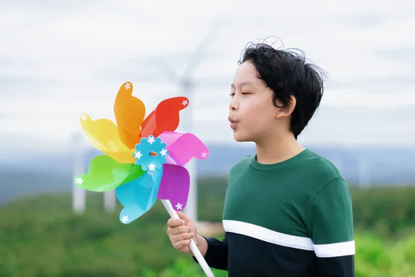 Progressive Young Asian Boy Playing Wind Pinwheel Toy Wind Turbine — 스톡 사진