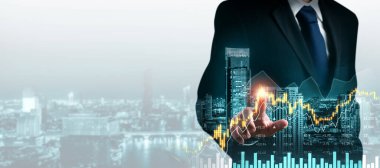 Businessman analyst working with digital finance business data graph showing technology of investment strategy for perceptive financial business decision. Digital economic analysis technology concept.