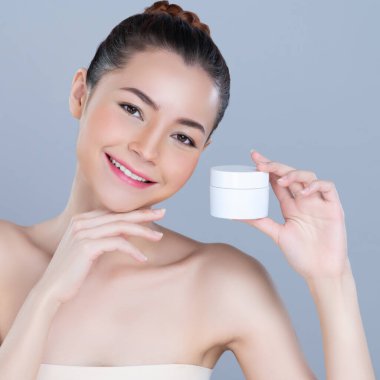 Glamorous beautiful perfect cosmetic skin with soft makeup woman portrait hold mockup jar cream or moisturizer for skincare treatment and anti-aging product advertisement in isolated background.