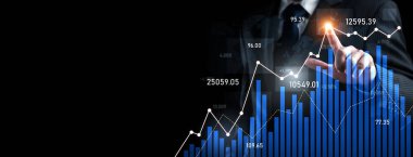 Businessman analyst working with digital finance business data graph showing technology of investment strategy for perceptive financial business decision. Digital economic analysis technology concept.