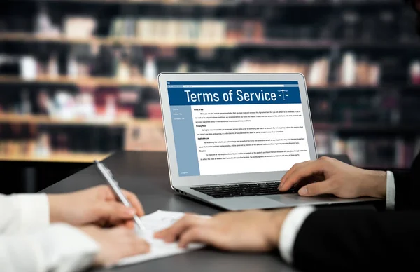 Online term of service conditions showing astute rules and regulations in using the website on a laptop computer screen for users to make an agreement