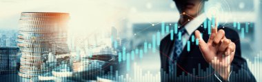 Businessman analyst working with digital finance business data graph showing technology of investment strategy for perceptive financial business decision. Digital economic analysis technology concept.
