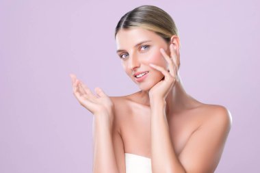 Alluring beautiful woman with perfect smooth and clean skin portrait in isolated background. Beauty hand gesture with expressive facial expression for skincare treatment product or spa.