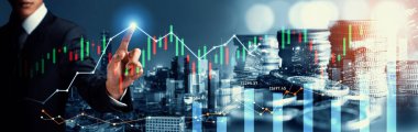 Businessman analyst working with digital finance business data graph showing technology of investment strategy for perceptive financial business decision. Digital economic analysis technology concept.