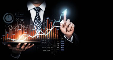 Businessman analyst working with digital finance business data graph showing technology of investment strategy for perceptive financial business decision. Digital economic analysis technology concept.