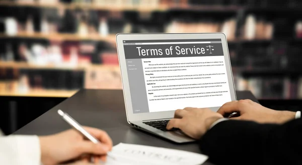 Online term of service conditions showing astute rules and regulations in using the website on a laptop computer screen for users to make an agreement
