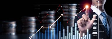 Businessman analyst working with digital finance business data graph showing technology of investment strategy for perceptive financial business decision. Digital economic analysis technology concept.