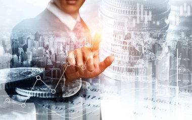 Businessman analyst working with digital finance business data graph showing technology of investment strategy for perceptive financial business decision. Digital economic analysis technology concept.
