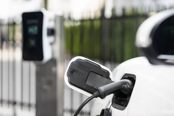 Focus Closeup Electric Vehicle Plugged Charger Device Blurred Background Public — Φωτογραφία Αρχείου