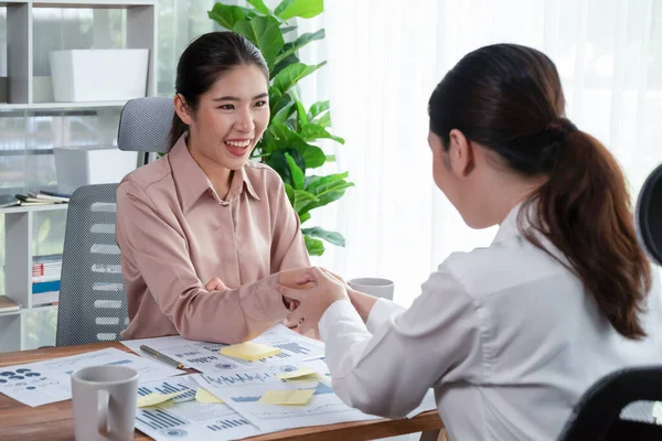 Two Asian Businesswomen Shaking Hands Modern Office Successfully Analyzing Piles — Stock Photo, Image