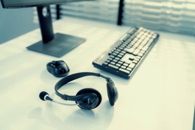 Essential equipment concept for competent online operators, call service agents, or online working. Customer service equipment, as well as helpdesk tools.