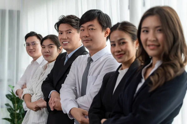 Cohesive Group Businesspeople Standing Row Holding Hand Line Together Meeting — 图库照片