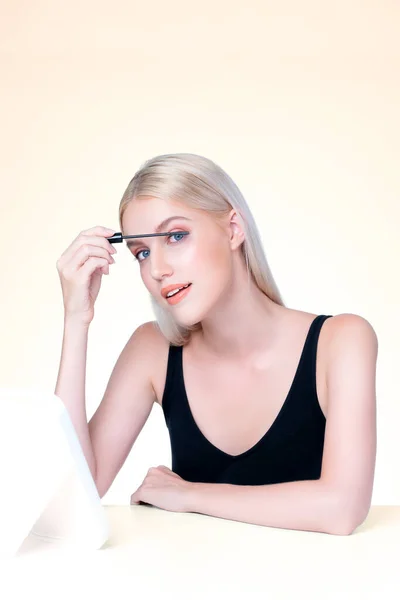 Personable Woman Blond Hair Putting Black Mascara Brush Hand Long — Stock Photo, Image