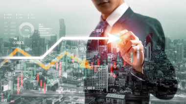 Businessman analyst working with digital finance business data graph showing technology of investment strategy for perceptive financial business decision. Digital economic analysis technology concept.