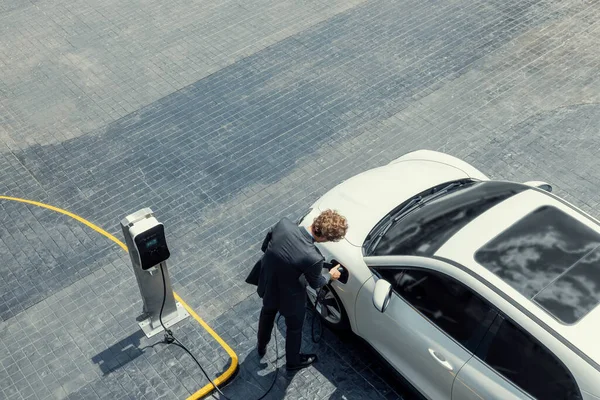 Aerial View Progressive Lifestyle Businesspeople Electric Car Connected Charging Station — 스톡 사진