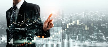 Businessman analyst working with digital finance business data graph showing technology of investment strategy for perceptive financial business decision. Digital economic analysis technology concept.