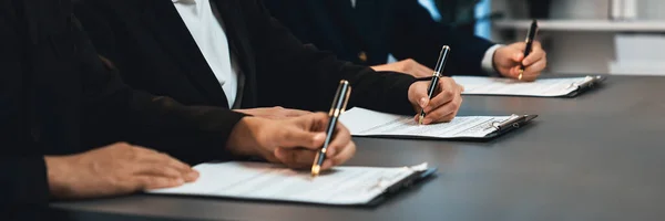 stock image Panorama view of corporate executives sign joint business contract in boardroom, negotiating partnership agreement for collaboration. Professional agreement between big corporations. Prodigy