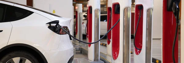 stock image EV charging station for electric car in concept of sustainable energy and eco power produced from green resource to supply to charger station to reduce dashing CO2 emission .