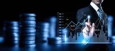 Businessman analyst working with digital finance business data graph showing technology of investment strategy for perceptive financial business decision. Digital economic analysis technology concept.