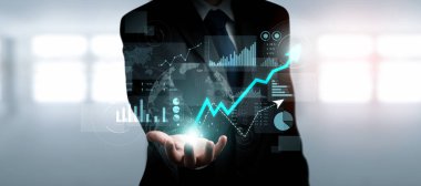 Businessman analyst working with digital finance business data graph showing technology of investment strategy for perceptive financial business decision. Digital economic analysis technology concept.
