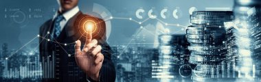 Businessman analyst working with digital finance business data graph showing technology of investment strategy for perceptive financial business decision. Digital economic analysis technology concept.