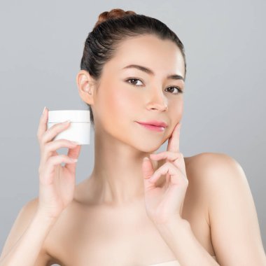 Glamorous beautiful perfect cosmetic skin with soft makeup woman portrait hold mockup jar cream or moisturizer for skincare treatment and anti-aging product advertisement in isolated background.